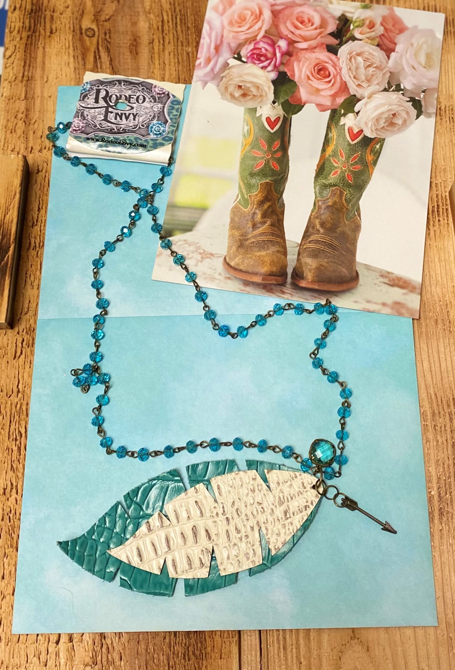 Rodeo Envy 30 inch Teal Beaded Chain with  Teal and White Leaf Cut Out