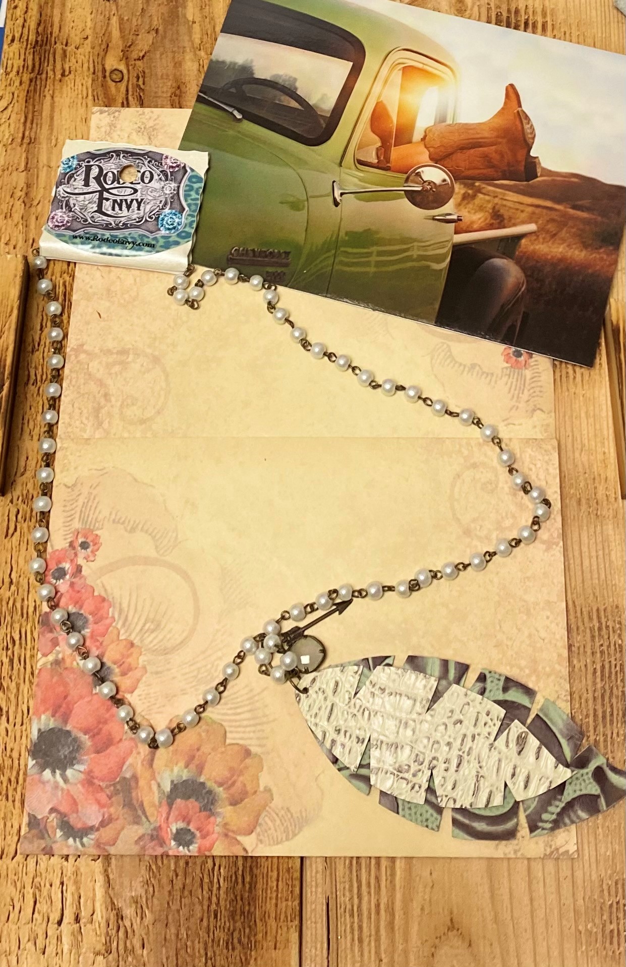 Rodeo Envy 30 inch Pearl Beaded Chain with Floral Teal and Tan Leaf Cut Out