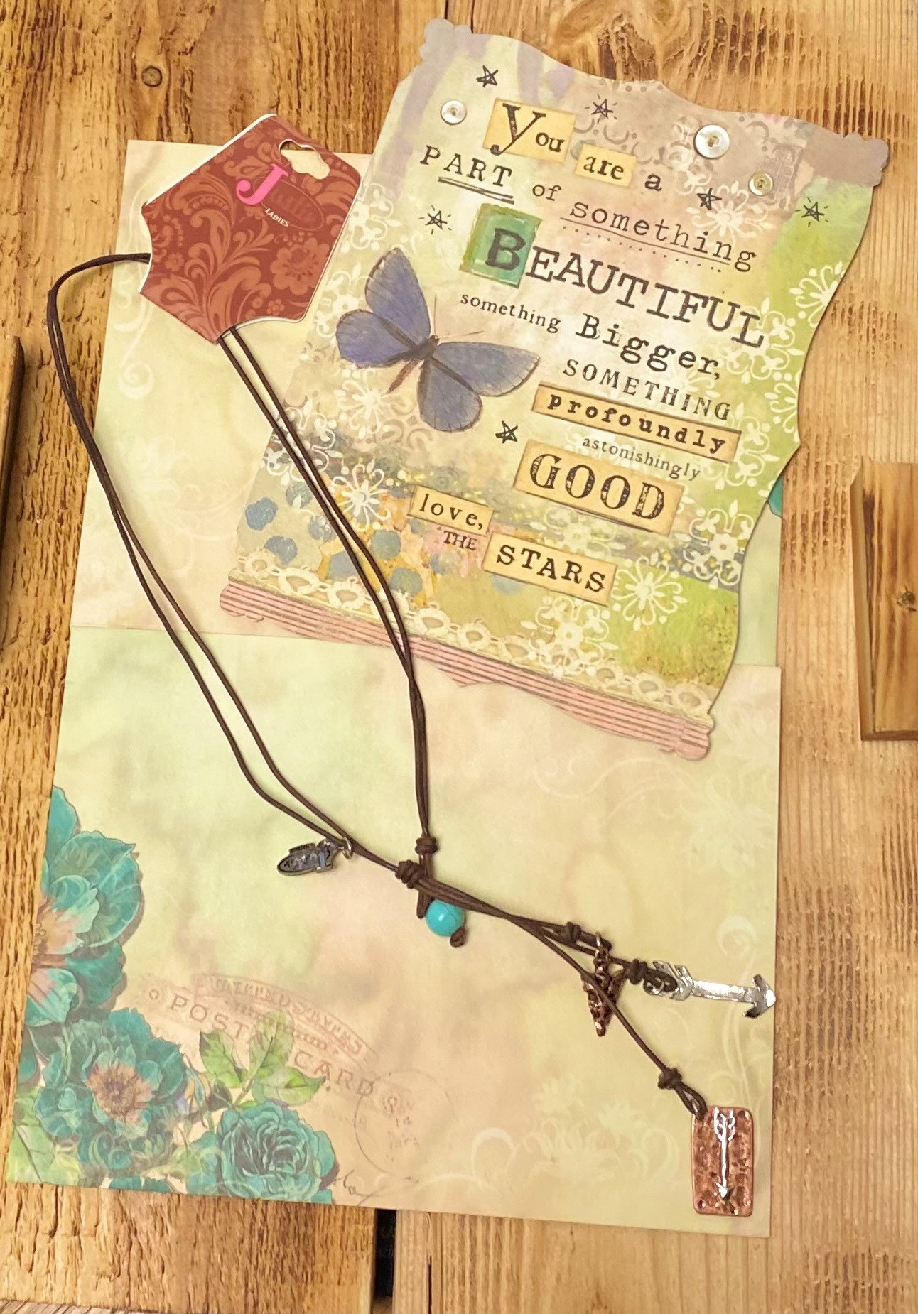 Justin Brown Leather Necklace with Teal Bead with 3 Arrow Charms Below the Bead