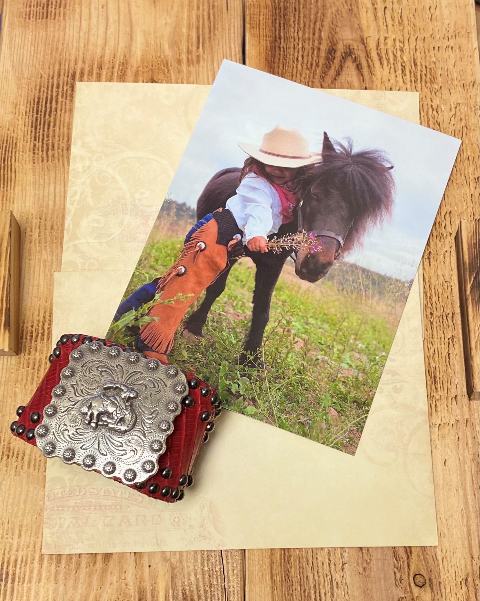 Red Leather Beaded trim Cuff with Silver Embellished Center Piece of Bronco Ride